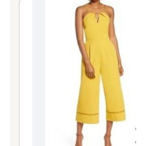 Adelyn Rae Anthropologie yellow jumpsuit dressy cropped spaghetti straps deep V